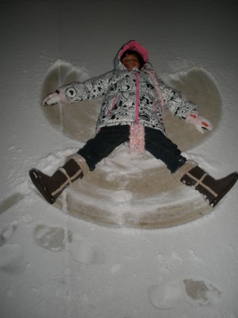 Kasen making a snow angel
